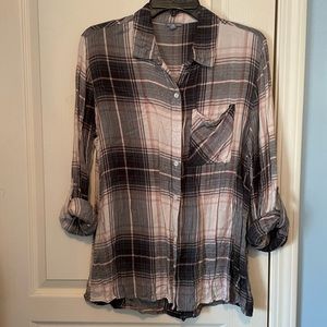 Gray, pink, and white plaid, long sleeve button up shirt.